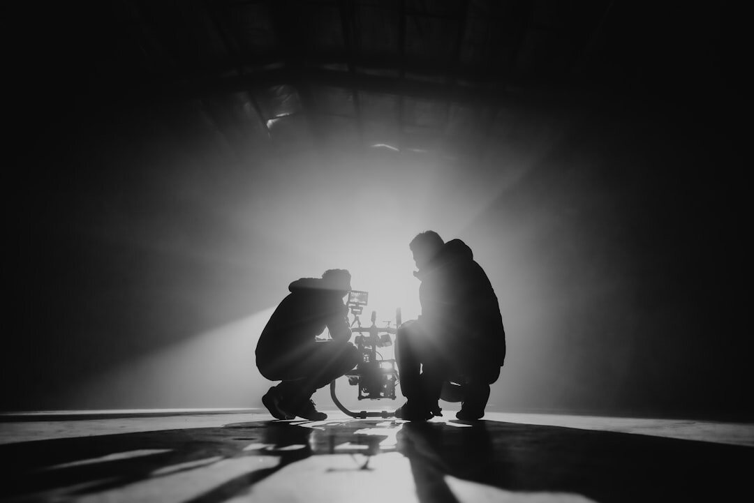 cinematographer adjusting lights