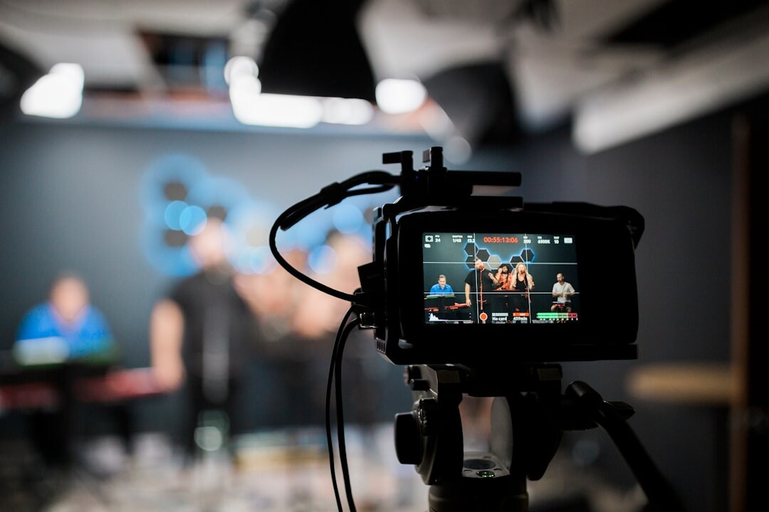 filmmaker reviewing video clips